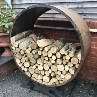 Rusty metal log storage nest
