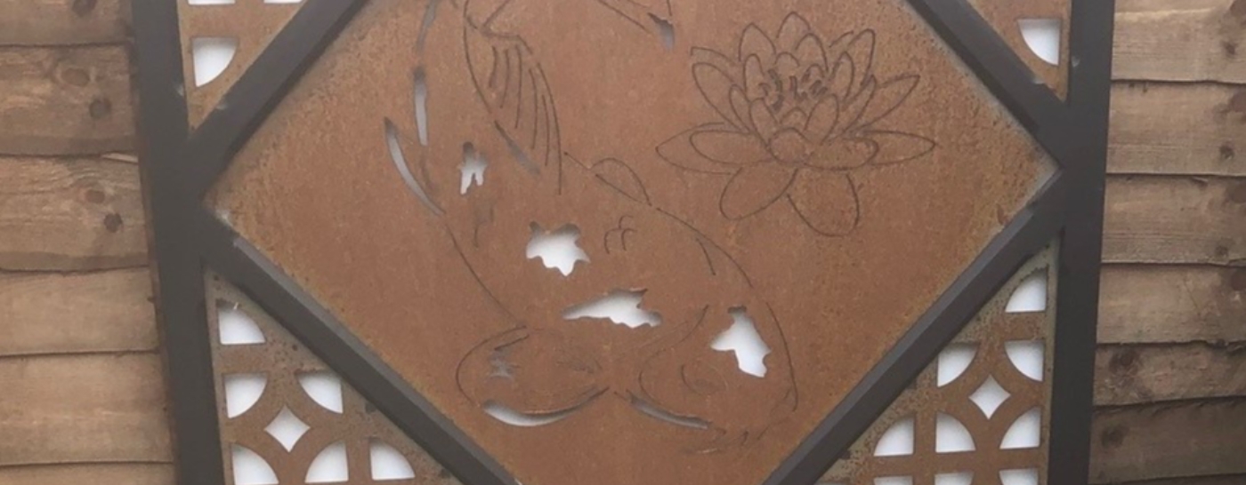 Bespoke corten rusty metal pond feature panel